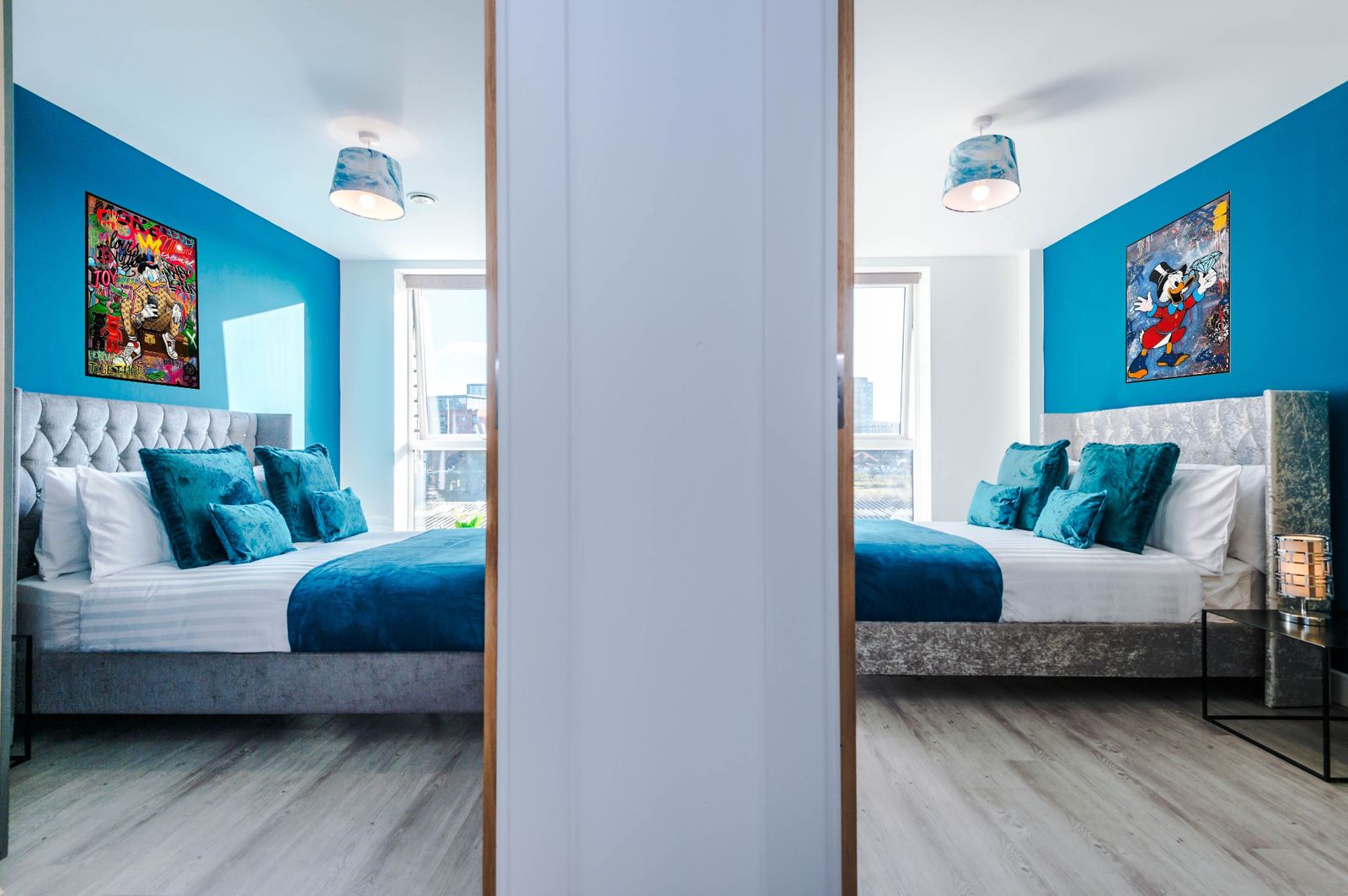 Bridgewater bedroom mirror reflection with styled bedding and statement art